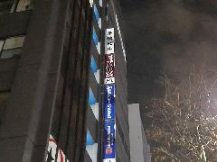 既存袖看板表示面交換　東京都中央区