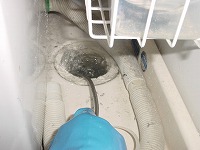 洗濯機パンから洗浄中