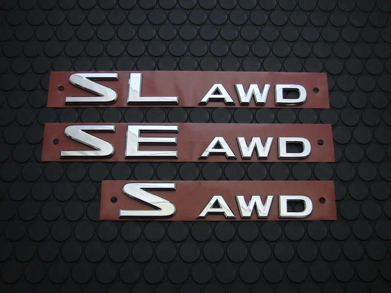 SE AWD/S AWD REAR EMBLEM