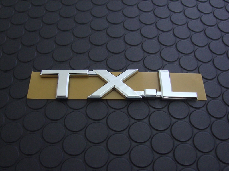 TX-L EMBLEM