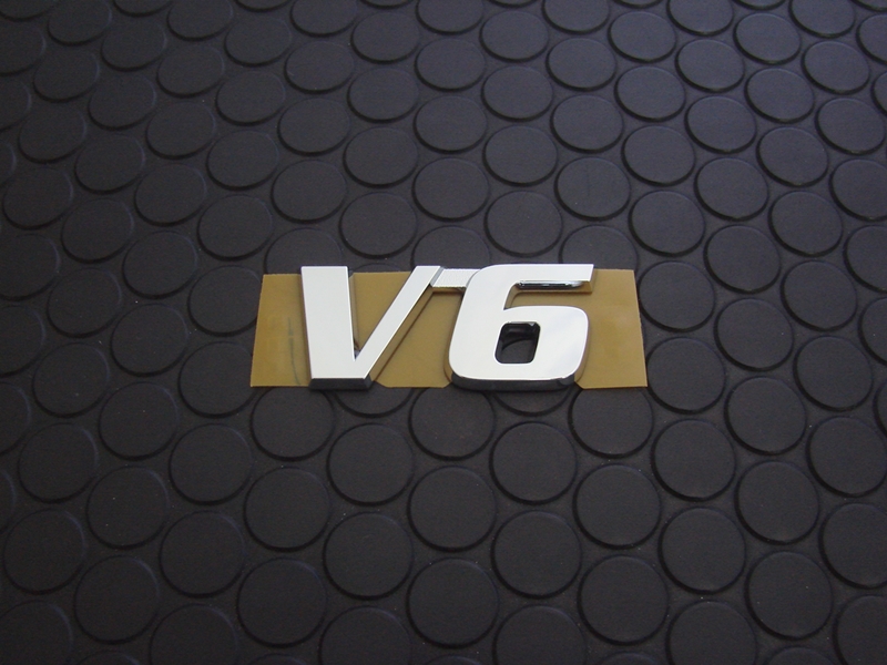 V6 EMBLEM