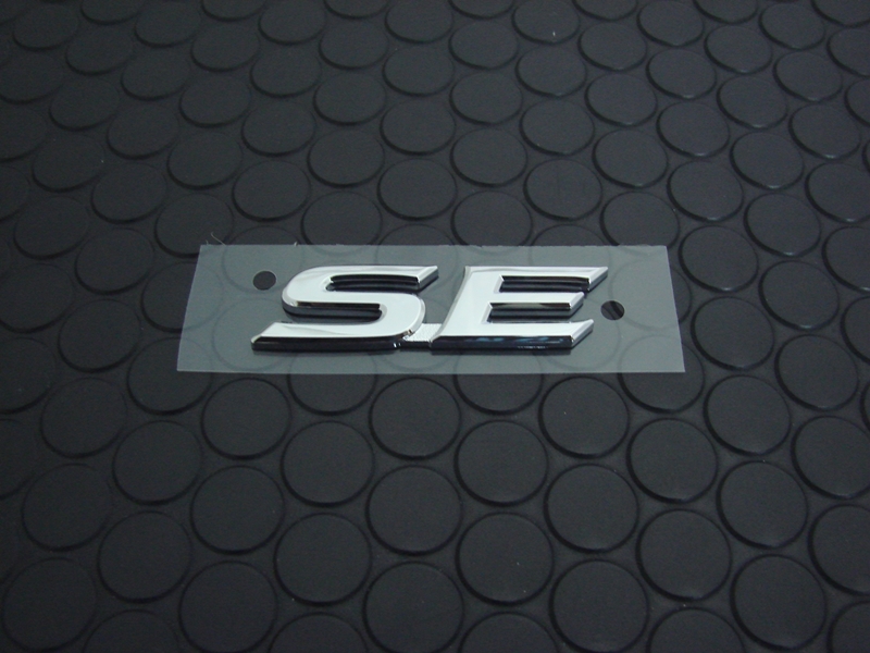 REAR SE EMBLEM